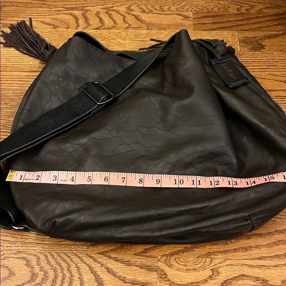 DanAzan slouchy one shoulder bag in brown leather with black adjustable strap